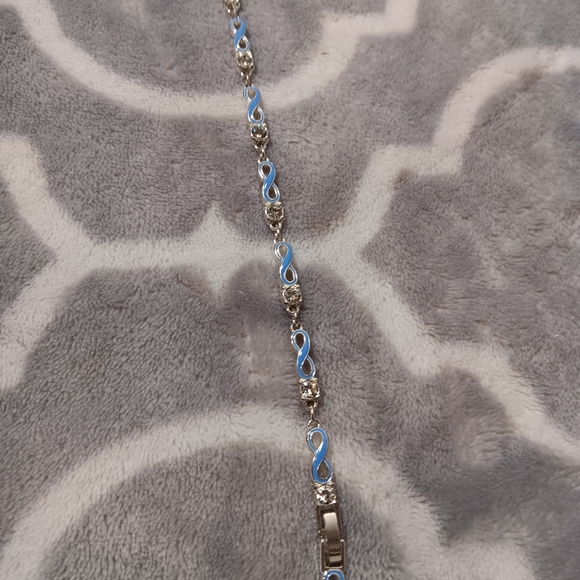 Blue enamel and crystal infinity bracelet. - Picture 9 of 14